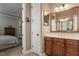 Bathroom featuring a large mirror and vanity at 913 S South Bend Dr, Durham, NC 27713