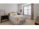Cozy bedroom featuring a comfortable bed and natural light from the window at 913 S South Bend Dr, Durham, NC 27713