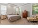 Bedroom featuring carpet floors, natural light, and a bed at 913 S South Bend Dr, Durham, NC 27713