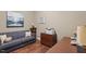 Comfortable office space with a sofa, desk, and ample storage for work or study at 913 S South Bend Dr, Durham, NC 27713