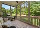 Relaxing screened patio with comfortable seating and a view of the lush backyard at 913 S South Bend Dr, Durham, NC 27713