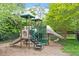 Community playground with slides and climbing structures, offering a fun and safe space for children at 913 S South Bend Dr, Durham, NC 27713