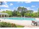 Large community swimming pool surrounded by lush landscaping and comfortable seating, perfect for leisure at 913 S South Bend Dr, Durham, NC 27713