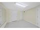 Finished basement offering versatile space with carpet and closet storage at 927 Jones Wynd, Wake Forest, NC 27587