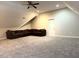Large bonus room with vaulted ceilings and comfortable seating at 1003 Red Sunset Dr, Apex, NC 27502