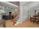 Open-concept foyer flows into the living room and dining area, showcasing the staircase at 1003 Red Sunset Dr, Apex, NC 27502