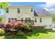 Exterior of the home featuring a deck and a well-maintained yard at 1007 Grandover Dr, Durham, NC 27713