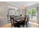 Open dining area with a view of the front entrance and living room, perfect for entertaining at 1007 Grandover Dr, Durham, NC 27713