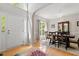 Bright and spacious front foyer with hardwood floors, large doorway and dining room at 1007 Grandover Dr, Durham, NC 27713