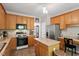 Eat-in kitchen featuring stainless steel appliances and lots of counter space at 1007 Grandover Dr, Durham, NC 27713