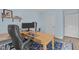 Bedroom with wood-look floors, blue walls, a ceiling fan, a desk and a rug at 102 Fairgrove Way Way, Cary, NC 27511