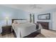 Comfortable bedroom features light blue walls and ample natural light at 102 Fairgrove Way Way, Cary, NC 27511