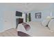 Bedroom with wood-look floors, blue walls, a ceiling fan, and comfortable bed at 102 Fairgrove Way Way, Cary, NC 27511