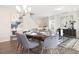 Elegant dining area featuring modern decor, ample seating, and natural light at 104 S Buggy Dr # 71P, Benson, NC 27504