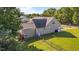 Spacious backyard featuring a well-maintained lawn, a fence, and the rear of the house at 106 Contender Dr, Clayton, NC 27520
