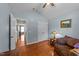 Bedroom with vaulted ceiling, wood floors, and natural light from the window at 106 Contender Dr, Clayton, NC 27520