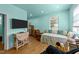 Bedroom featuring daybed, small desk, and entertainment center at 106 Contender Dr, Clayton, NC 27520
