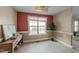 Cozy dining area with pool view, complemented by natural light and a charming valance at 106 Contender Dr, Clayton, NC 27520