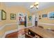 Inviting dining room with hardwood floors and views into the kitchen at 106 Contender Dr, Clayton, NC 27520