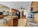 Spacious kitchen features granite countertops, wooden island, and modern appliances at 106 Contender Dr, Clayton, NC 27520