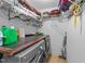 Functional laundry room with washer, dryer, utility sink, and ample storage space, designed for efficient organization at 106 Contender Dr, Clayton, NC 27520