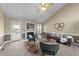 A cozy living room with fireplace, vaulted ceilings, plush seating, and carpet flooring at 106 Contender Dr, Clayton, NC 27520