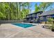 Beautiful backyard with swimming pool, landscaped yard, and deck offering serene outdoor living at 106 Silverwood Ln, Cary, NC 27518