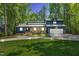 Gorgeous home with well-kept lawn, bright two-car garage, and unique window features at 106 Silverwood Ln, Cary, NC 27518