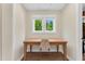 Bright workspace with a large window, desk, and chair, perfect for a home office at 106 Silverwood Ln, Cary, NC 27518