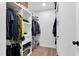 Organized walk-in closet with custom shelving, hanging rods, and ample storage space for clothes and accessories at 106 Silverwood Ln, Cary, NC 27518