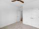 Bedroom with fan and double doors at 109 Imagine Way, Pittsboro, NC 27312