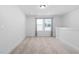 Bonus room featuring carpet, minimalist aesthetic, and a window at 109 Imagine Way, Pittsboro, NC 27312