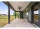 The covered patio features ceiling fans and provides an excellent view of the spacious backyard at 109 Imagine Way, Pittsboro, NC 27312