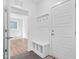 Mud room featuring a built-in bench and storage, with hooks for hanging items at 109 Imagine Way, Pittsboro, NC 27312
