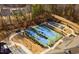 Aerial view of the community amenities, including the clubhouse and pickleball courts at 1121 Coast Grade St, Wake Forest, NC 27587