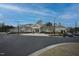 Beautiful clubhouse entrance with ample parking and lovely landscaping at 1121 Coast Grade St, Wake Forest, NC 27587