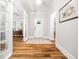 Welcoming foyer with hardwood floors and an open view to the living area at 1121 Coast Grade St, Wake Forest, NC 27587