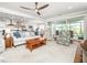 Bright living room offers an open concept and hardwood floors with back patio access at 1121 Coast Grade St, Wake Forest, NC 27587