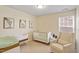 A light-filled Bedroom with crib, rocking chair, and soothing decor at 114 Red Robin Rd, Durham, NC 27703