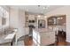Bright kitchen featuring stainless steel appliances and a granite island at 114 Red Robin Rd, Durham, NC 27703