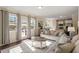 Sun-filled living room with direct access to the outside, featuring comfortable seating at 114 Red Robin Rd, Durham, NC 27703