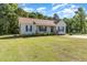 Well-maintained one-story home with large front yard, mature trees and welcoming curb appeal at 116 Meade Dr, Four Oaks, NC 27524