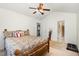 Spacious main bedroom with vaulted ceiling, ceiling fan, and carpet at 116 Meade Dr, Four Oaks, NC 27524