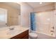 Bathroom featuring a bathtub and a coordinated blue shower curtain at 116 Shawnee Dr, Louisburg, NC 27549