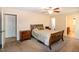 Bedroom featuring neutral walls, carpeted floors, and a bed with decorative pillows at 116 Shawnee Dr, Louisburg, NC 27549