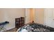 This bedroom features a tidy bed and nine-cubby storage shelf at 116 Shawnee Dr, Louisburg, NC 27549