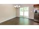 Bright dining area with sliding glass doors that lead to the backyard at 116 Shawnee Dr, Louisburg, NC 27549