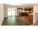 Spacious kitchen with stainless steel appliances and dark wood cabinetry, with a dining area nearby at 116 Shawnee Dr, Louisburg, NC 27549