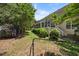 Spacious backyard with mature trees and lush greenery at 1204 Caribou Xing, Durham, NC 27713