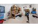 This bedroom features a wooden bunk bed, desk, and playful decor at 1204 Caribou Xing, Durham, NC 27713